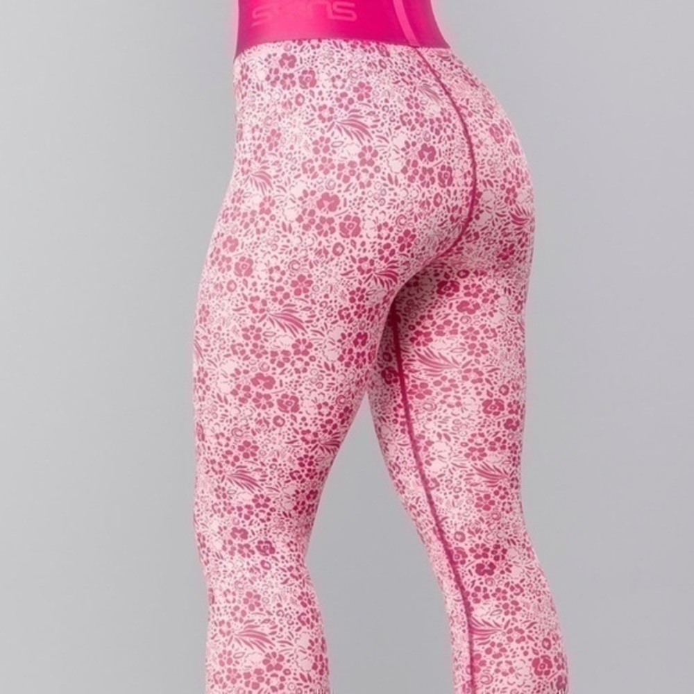 SKINS Pro Performance DNAmic Primary Compression Tights Floral gently preloved - Picture 12 of 14